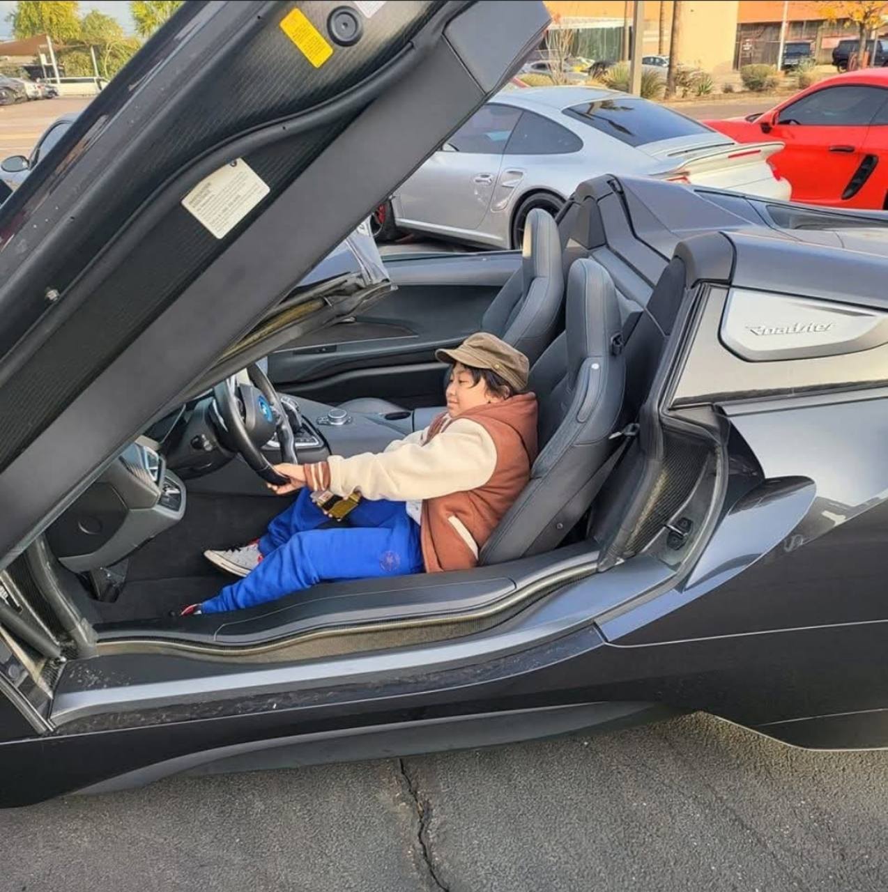Giovanni Ieremias Allen III. Giovanni Ieremias Allen III in his father Johnny’s BMW i8 convertible. Caption supplied by Johnny.